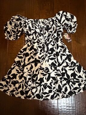 A Hint of Blush Black & Off White Floral Midi Dress with Tassel Tie